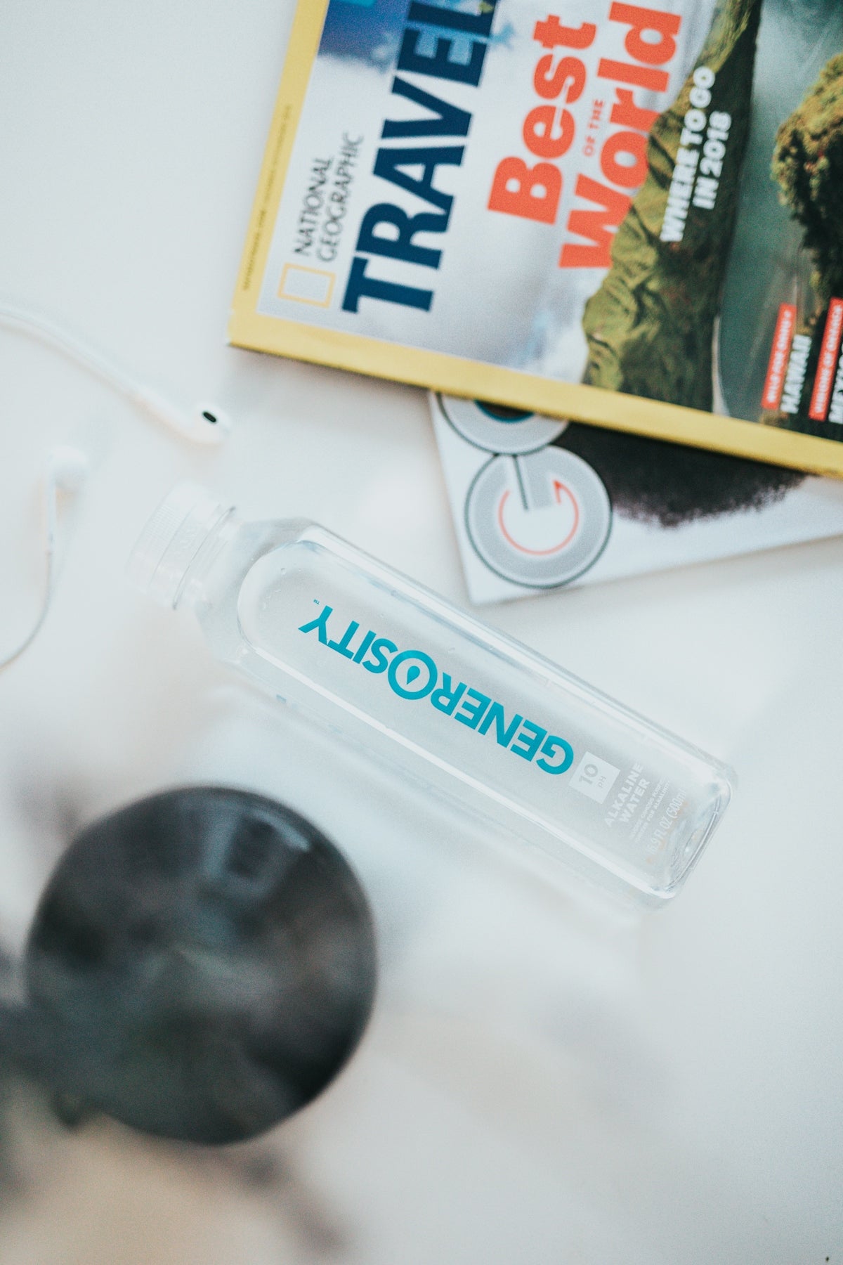 white and blue plastic bottle